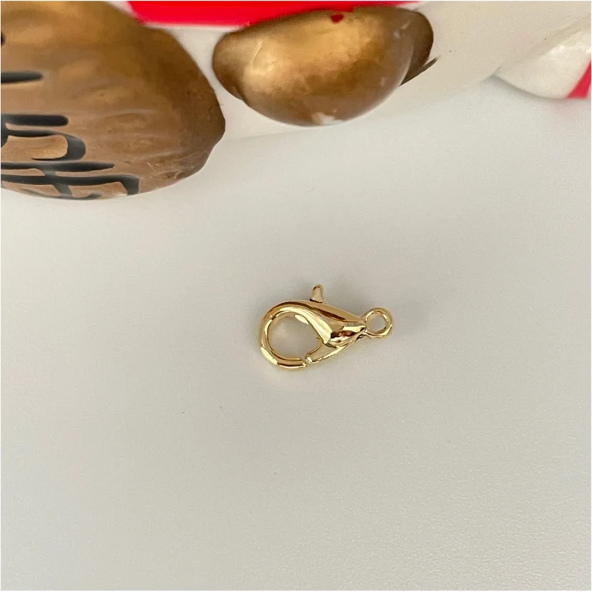 AO104 Mosquetón Langosta 10 mm Accesorio Baño Oro 100006
