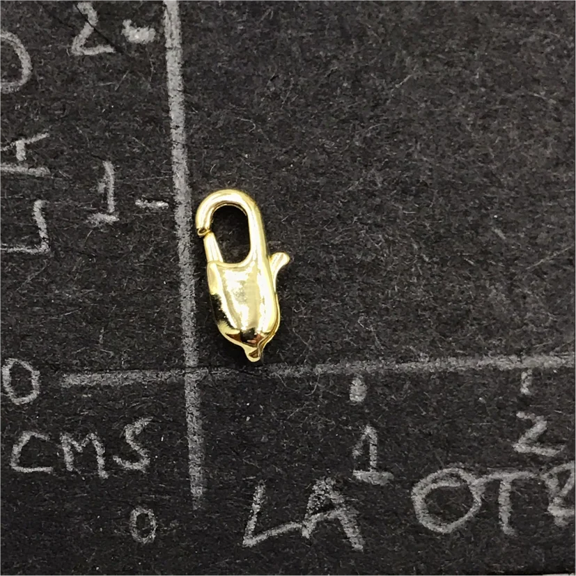 AO64 Mosquetón Rectangular 9mm Accesorio Baño Oro 100007