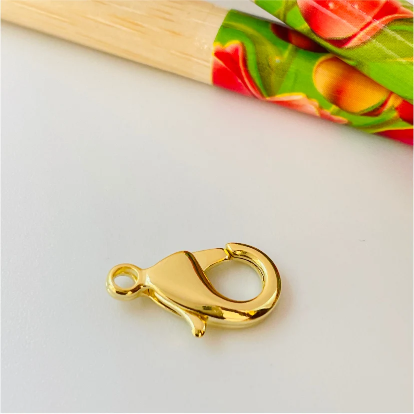 AO74 Mosquetón Langosta 14 mm Accesorio Baño Oro 100007