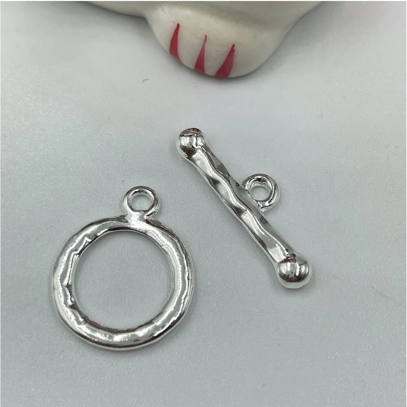 AP103 Broche OT Irregular diá. 15 mm largo palito 20 mm Accesorio Baño Plata 100009