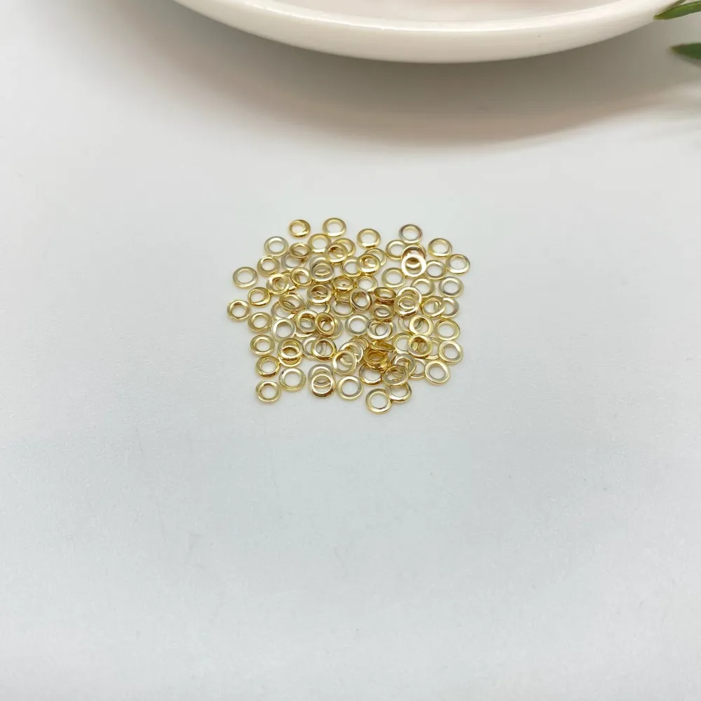 MO48 Argolla Plana Cerrada diá. Ext 2.7 mm diá Int. 1.7 mm Espesor 0.6 mm Accesorio Baño Oro 100012