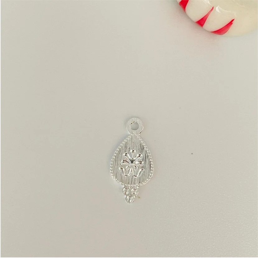 FP481 Mini Gota Flor estampada 12x6 mm Figura Baño Plata 100015