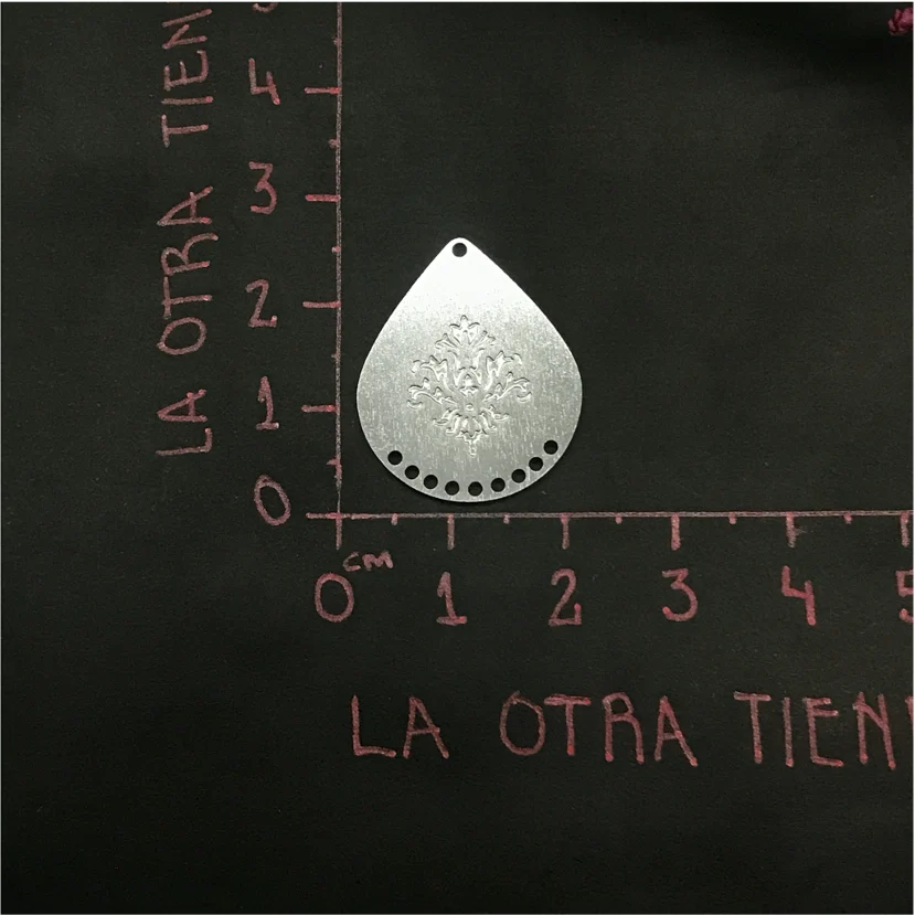 FP518 Gota Flor Fuego 9 Perforaciones 20 x 25 mm Figura Baño Plata 100015