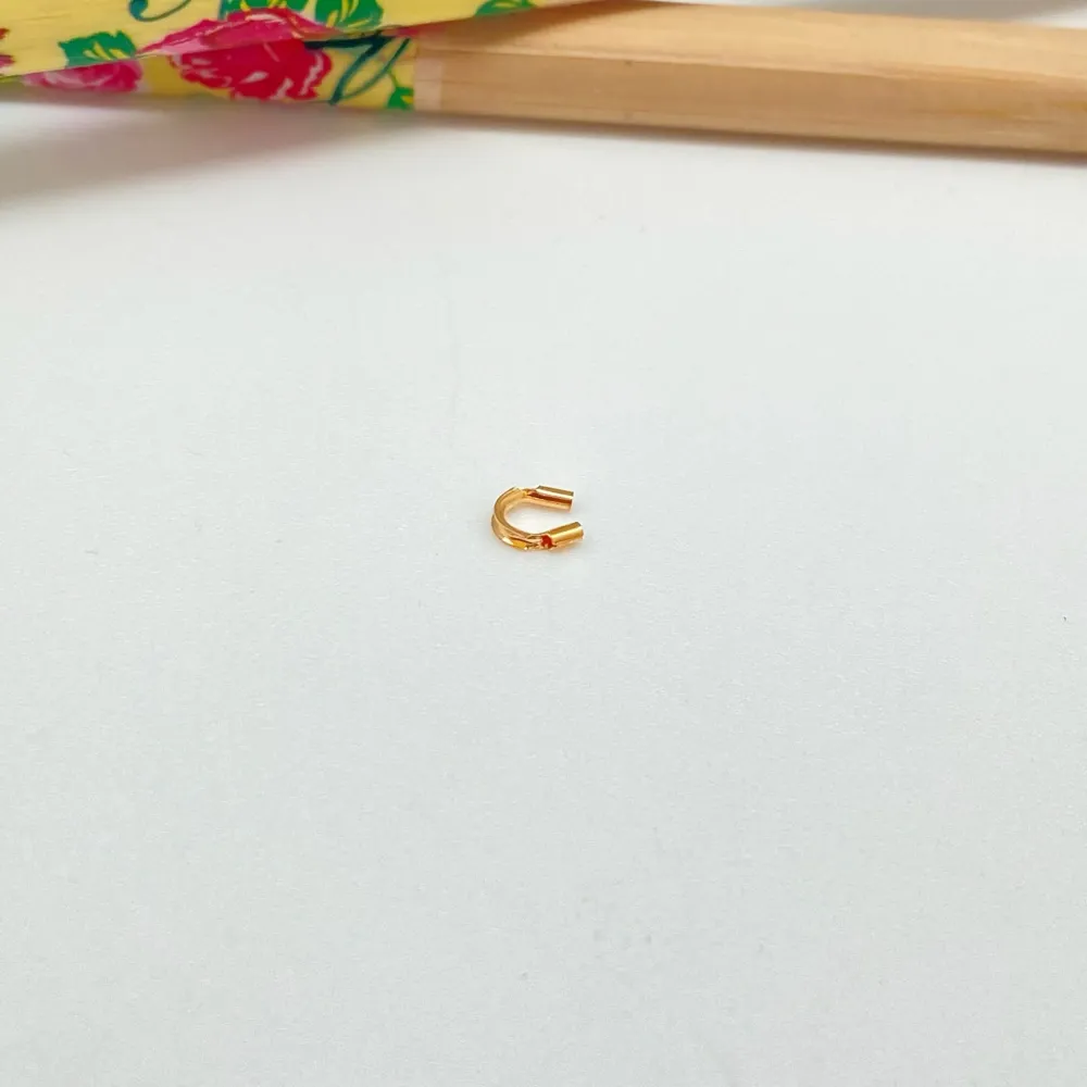 IN32 Cubre alambre Diámetro Interno 0.56 mm Baño Oro Insumo Neutro 100017