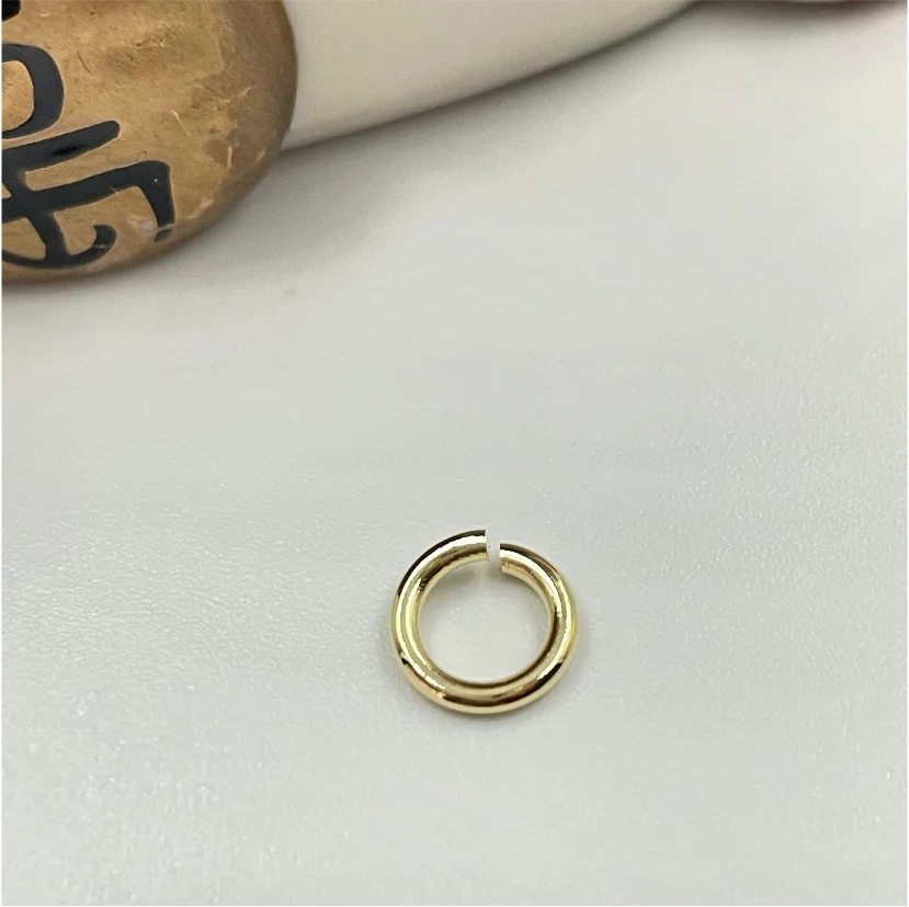 AO73 Argolla Diá. Externo 7 mm Diá. Interno 5 mm Espesor 1.2 mm Accesorio Baño Oro 100027