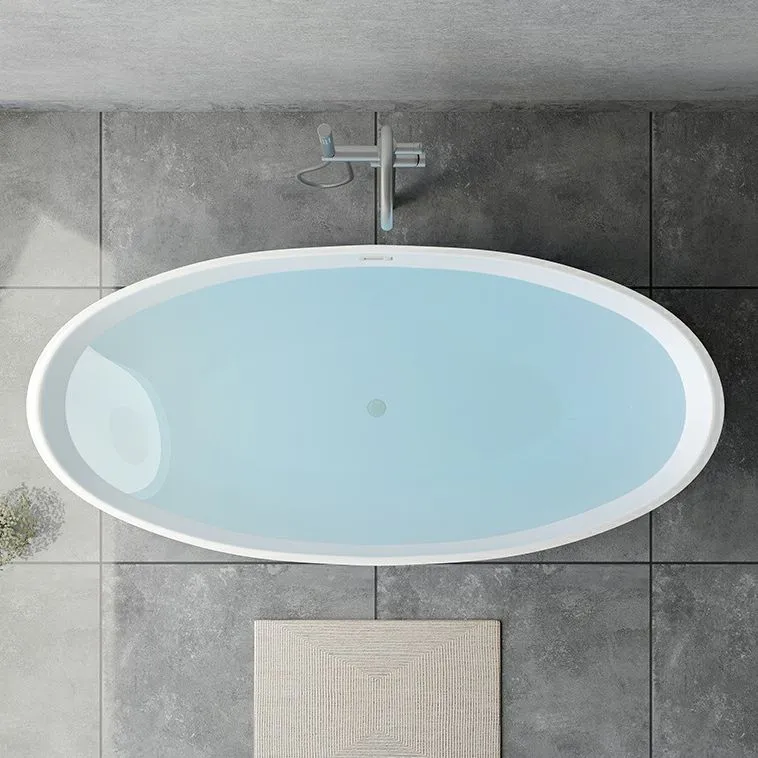 Bañera independiente de inmersión moderna, bañera ovalada de acrílico con borde de desbordamiento Blanco Clearhalo