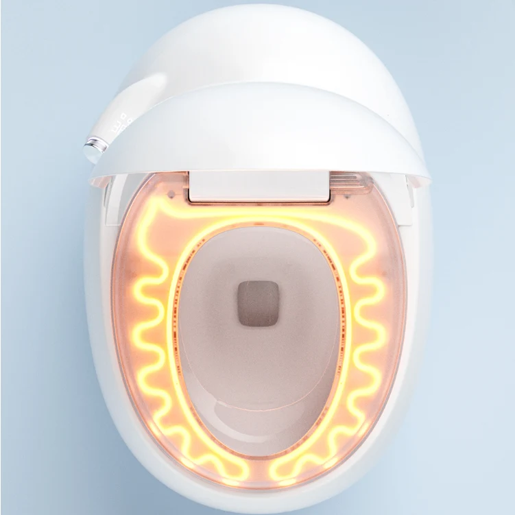 Bidé de cerámica blanco redondo con sensor de pie contemporáneo y asiento calefactable para montaje en suelo Clearhalo