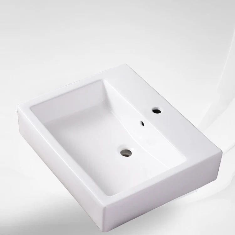 Fregadero del baño Fregadero de un orificio de cerámica con desbordamiento rectangular blanco con grifo Clearhalo