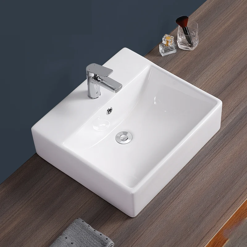 Fregadero del baño Fregadero de un orificio de cerámica con desbordamiento rectangular blanco con grifo Clearhalo