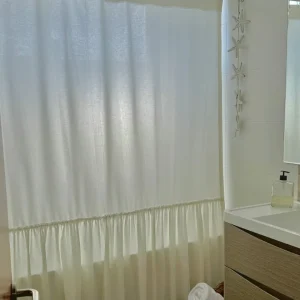CORTINA DE BAÑO ALGODÓN VUELOS BEIGE Complementa Diseño