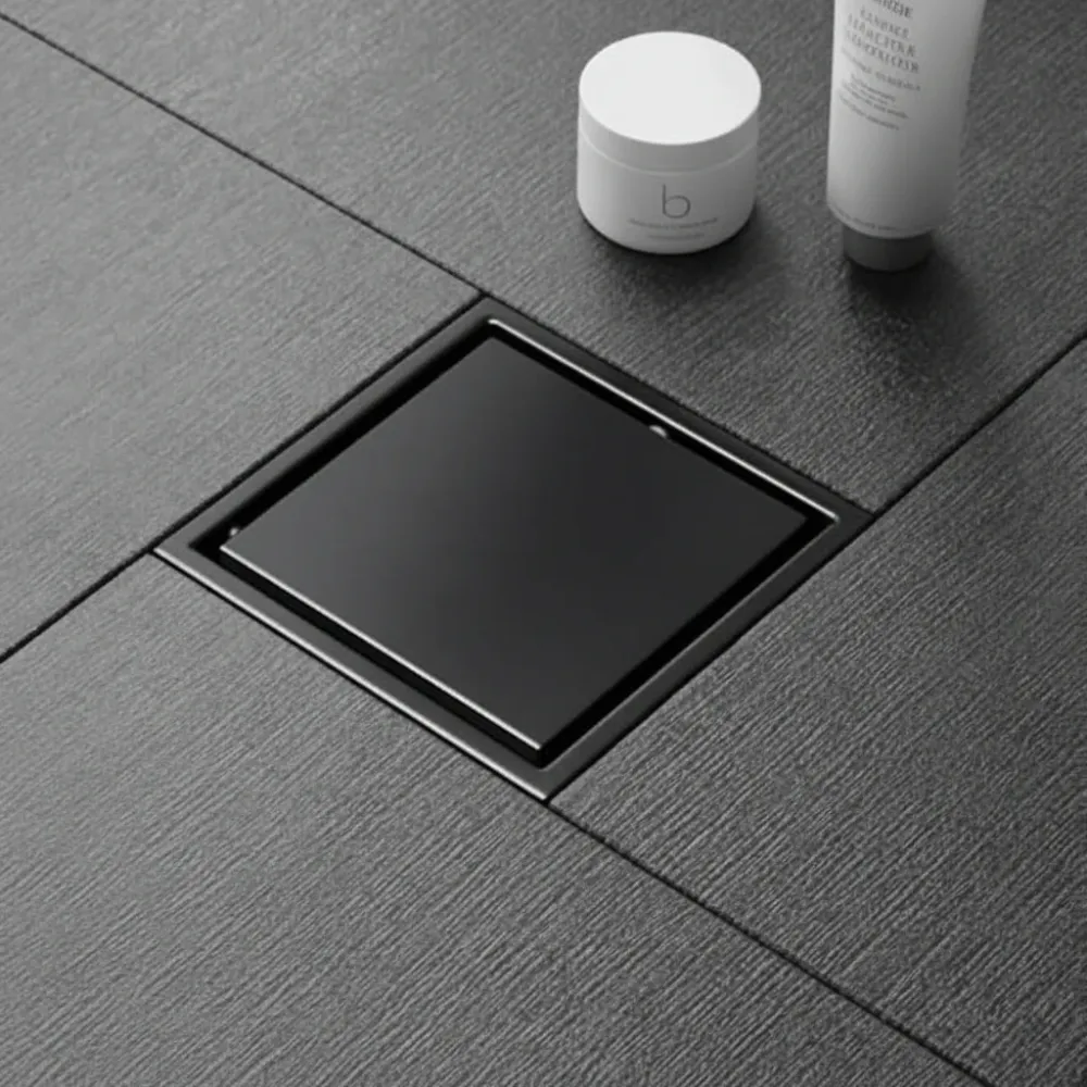 Desagüe para piso cuadrado 10 x 10 cm con doble función para inserción de baldosa en acero inoxidable negro