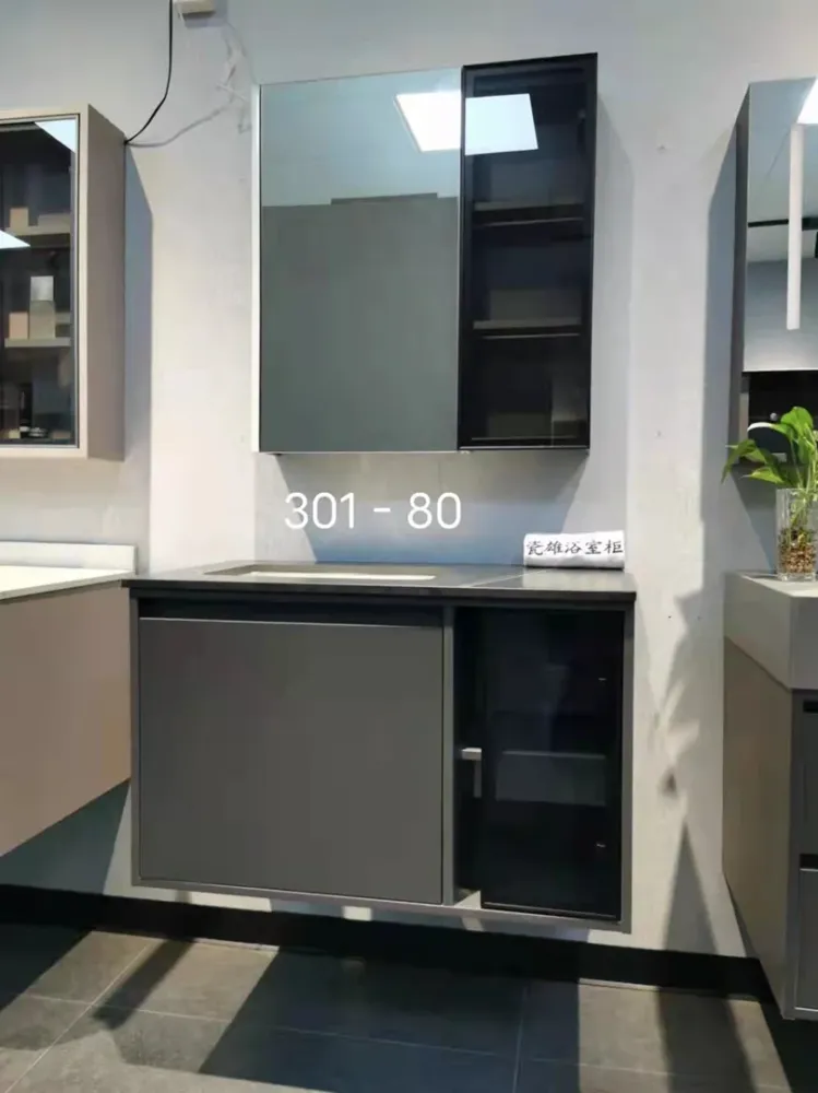 MUEBLE D/BAÑO CON ESPEJO D/ALUMINIO GRIS+ENCIMERA NEGRO 61*48*55CM KENNEDY STRUCTURES CORP.