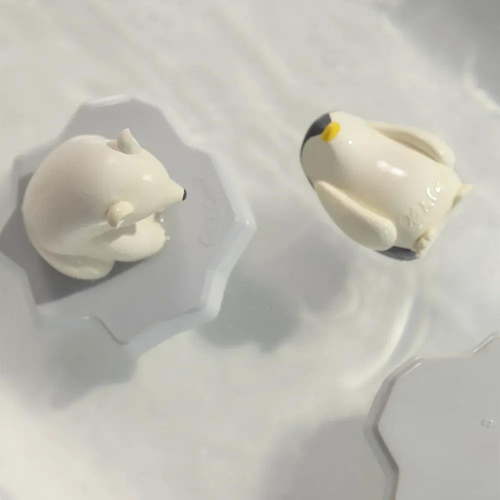 Pingüino Juguete de Baño Oli & Carol
