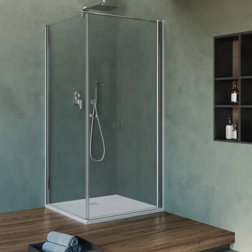 Cabina de ducha 90x70 cm con puerta de apertura abatible y pared fija en cristal transparente de 6 mm