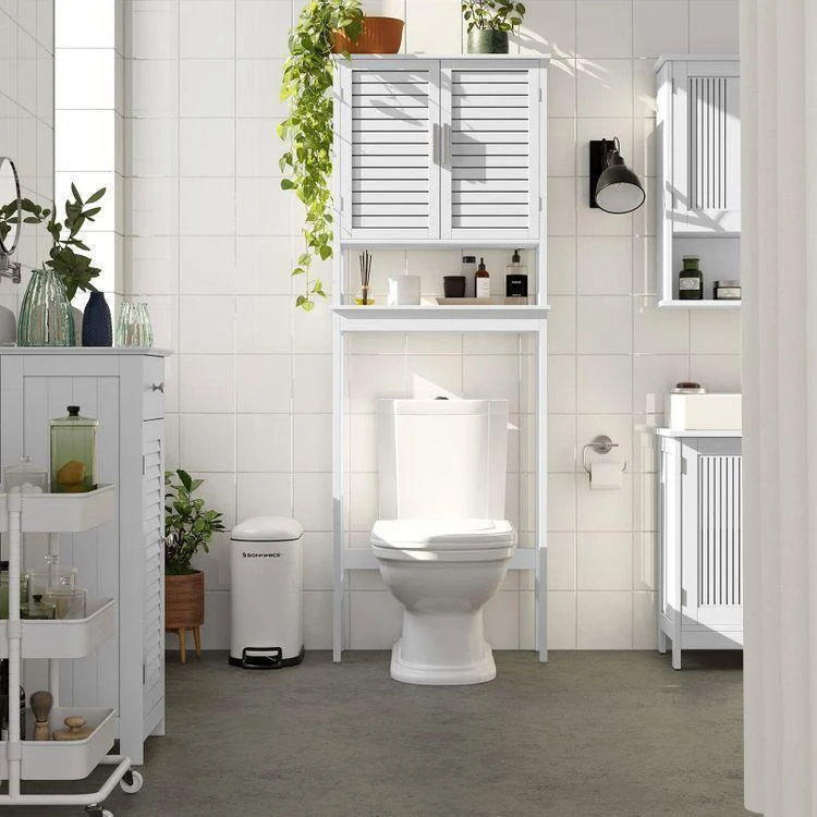 Banqueta de Baño Almacenamiento de bambú sobre el inodoro blanco